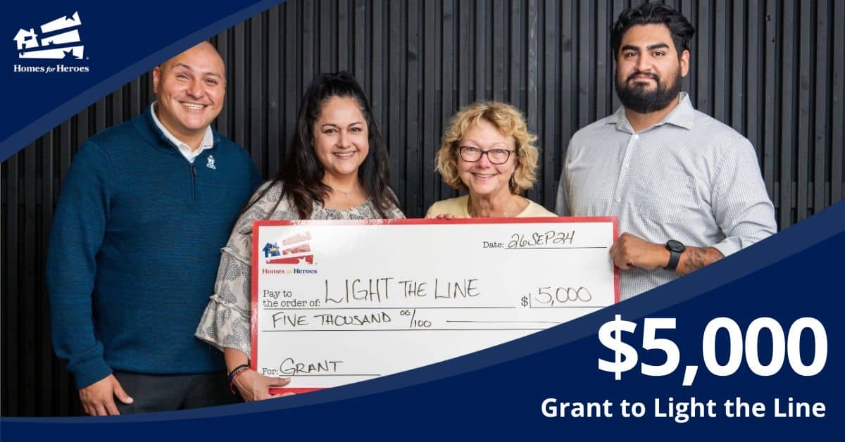 Light the Line IL receives 5000 grant from Homes for Heroes Foundation features Carlos Liz Elizabeth Joshua holding big check2