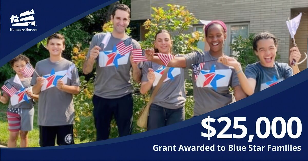 Blue Star Families waving US flags outside building nonprofit receives 25000 grant from Homes for Heroes Foundation