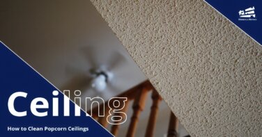 View looking up at a popcorn ceiling on one level and a lofted second level on the left half of the image