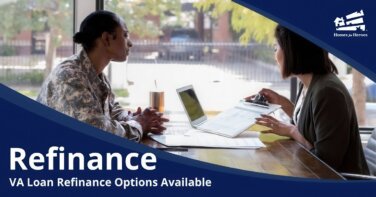 female loan officer reviews female veterans va refinance loan application at desk in office Homes for Heroes