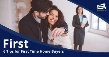 man woman couple holding keys real estate agent behind 1st time homebuyers Homes for Heroes