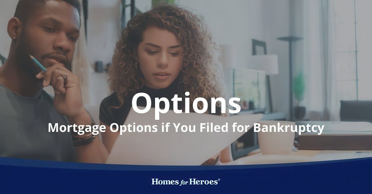 serious young couple sitting at dining room table looking over paperwork about home loans for people who filed for bankruptcy ways to improve finances Homes for Heroes