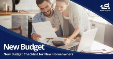 young man woman couple at kitchen table documents calculator laptop working on new home budget Homes for Heroes