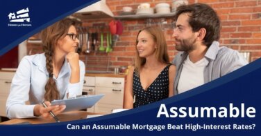 young man woman meeting with real estate agent in kitchen discussing assumable mortgage options Homes for Heroes