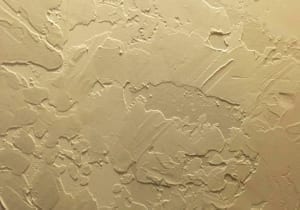 skip-trowel method of ceiling texture in off-white