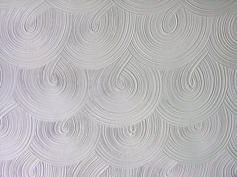 stucco pattern in a circle swirl on a ceiling