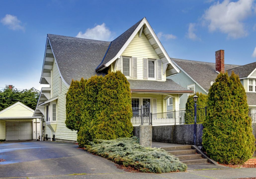 canary yellow and soft grey on single family home